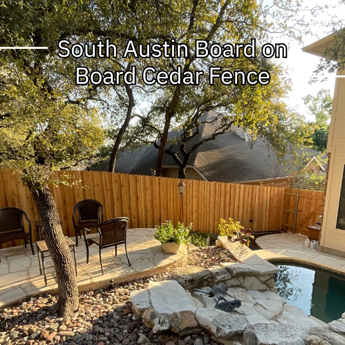 A cedar vertical fence with staggered panels and metal posts