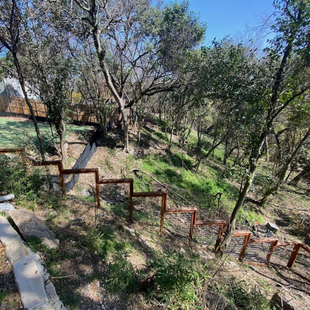 Texas-style bull panel fence for outdoor space