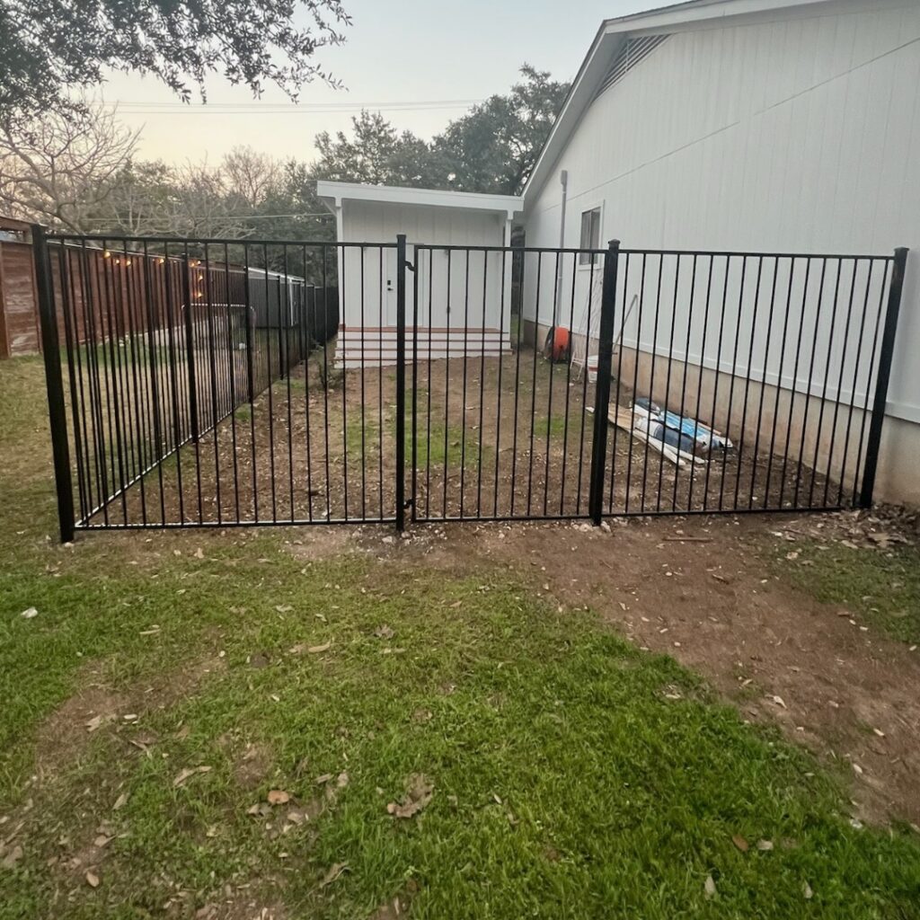 Texas ornamental fence with iron pickets