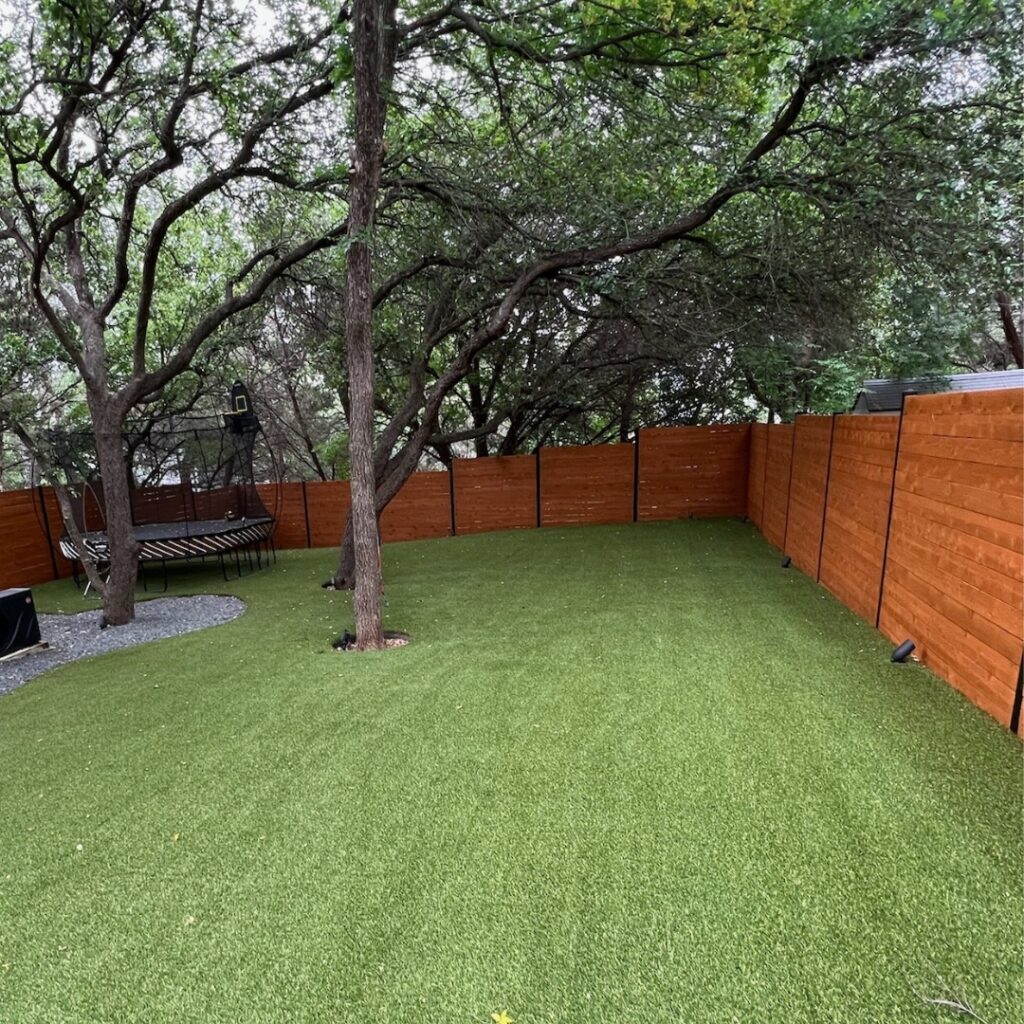 Horizontal wood fence in Austin, Texas — ideal for modern landscape aesthetics.