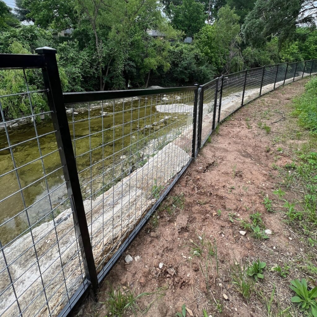 Bull panel fence with wood frame in Austin