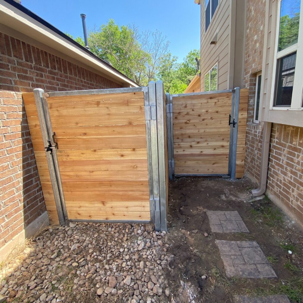 Horizontal fencing built with treated wood slats for longevity and visual appeal.