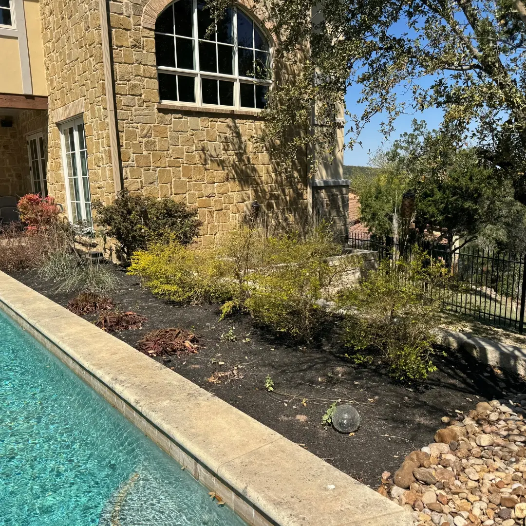 Open space with visible dirt and clutter before deck build-out started