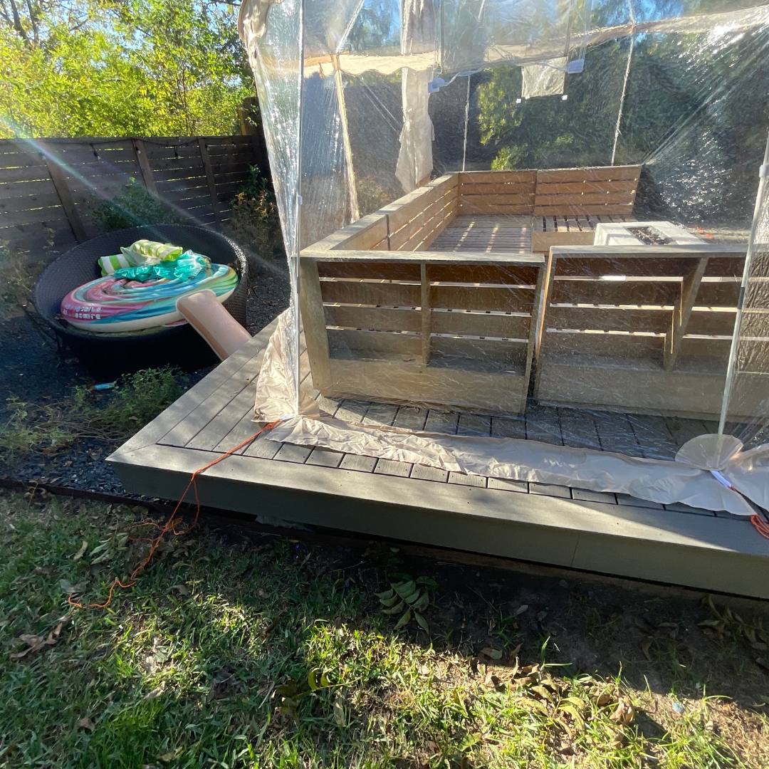 Backyard area before patio cover installation with open sky and no overhead structure