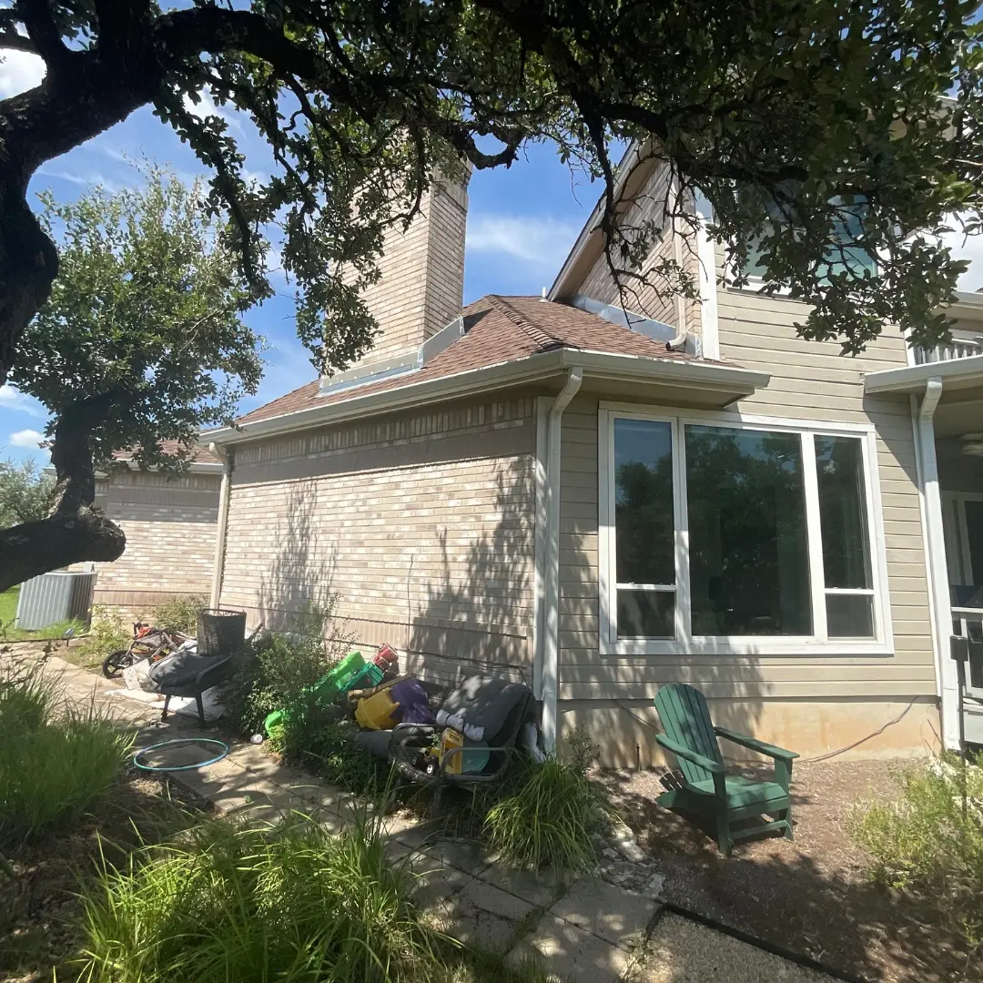 Exterior wall with weathered siding and no skirting or soffit installed