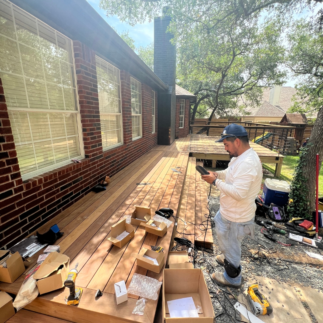 Partial installation of hardwood deck boards.