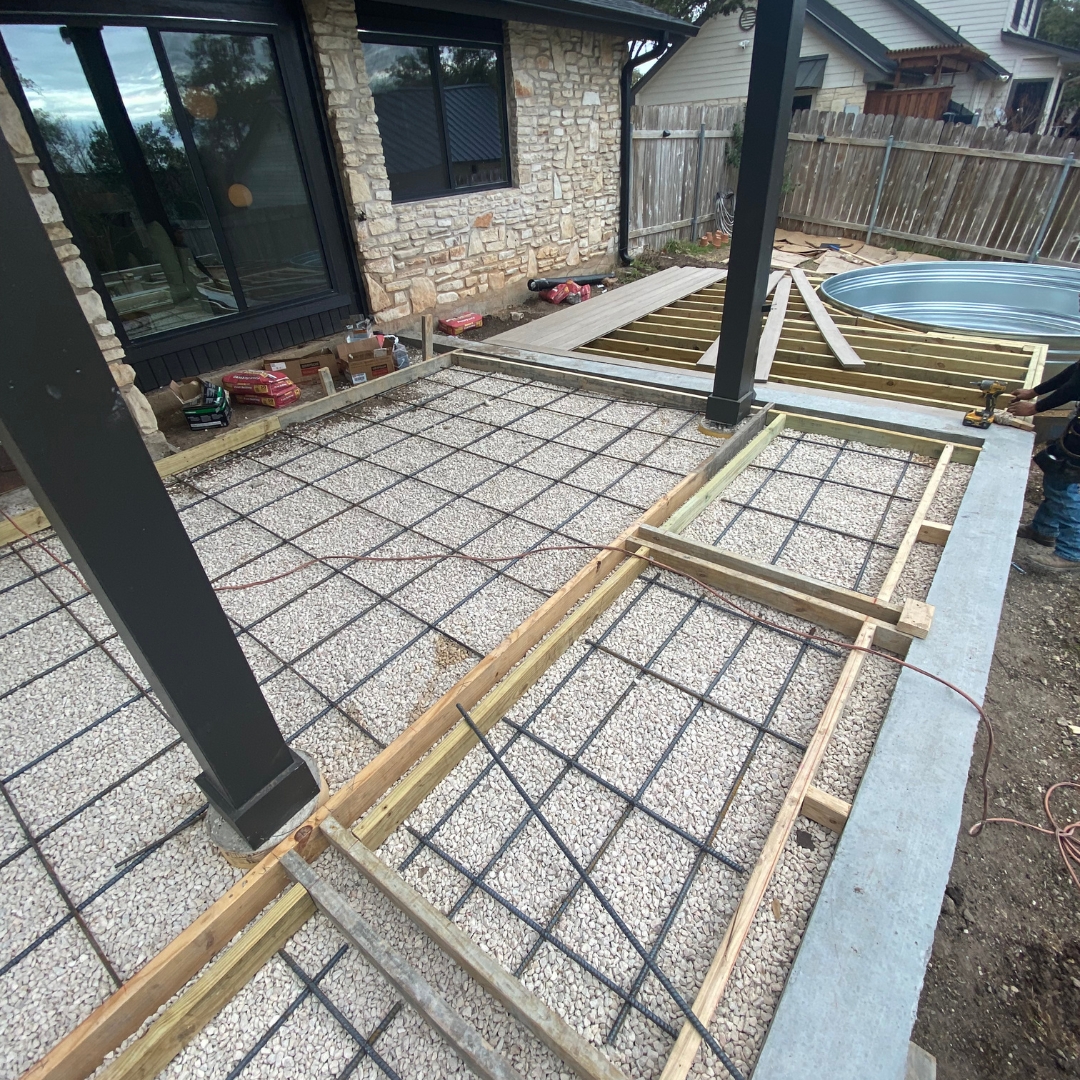 Mid-construction view showing multiple elements of the deck build.