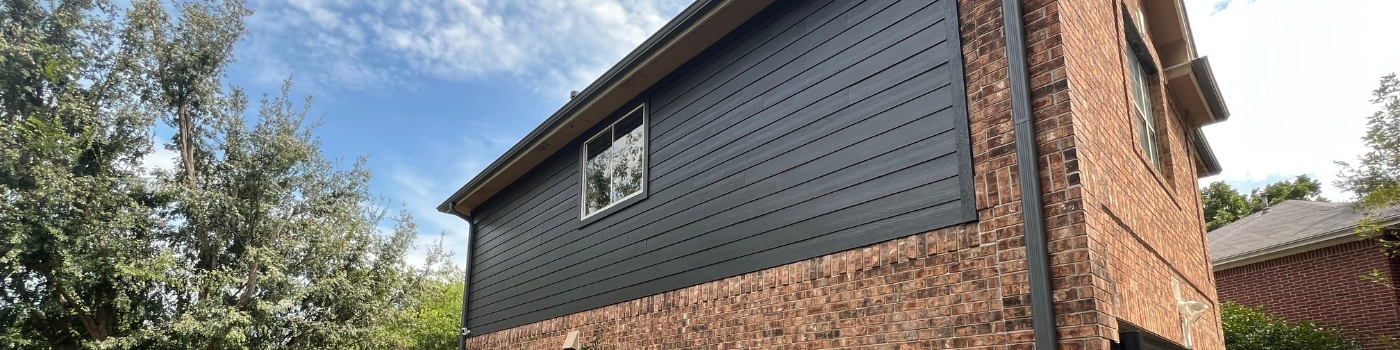 New Hardie Lap Siding fully installed and painted.