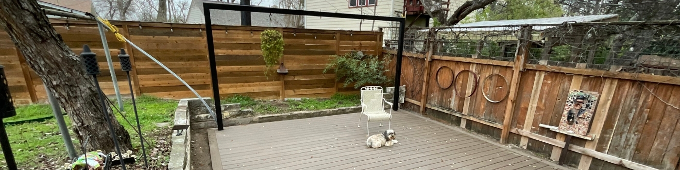 Deck paired with a custom mild steel trellis as a backdrop