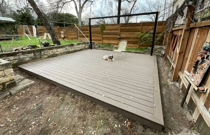 Deck paired with a custom mild steel trellis as a backdrop