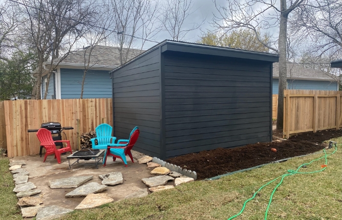 Driveway with brand-new detached garage ADU and modern finish.