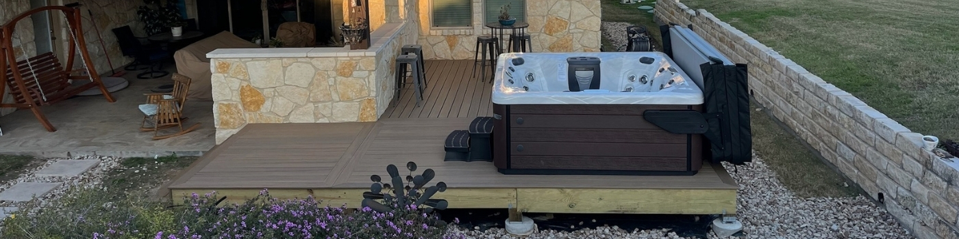 Wide shot of the new deck and steps blending into the backyard