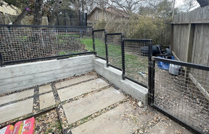 nstalled bull panel railing with welded steel frame, mounted securely on a concrete wall.