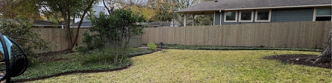 Completed Western Red Cedar fence with grey finish