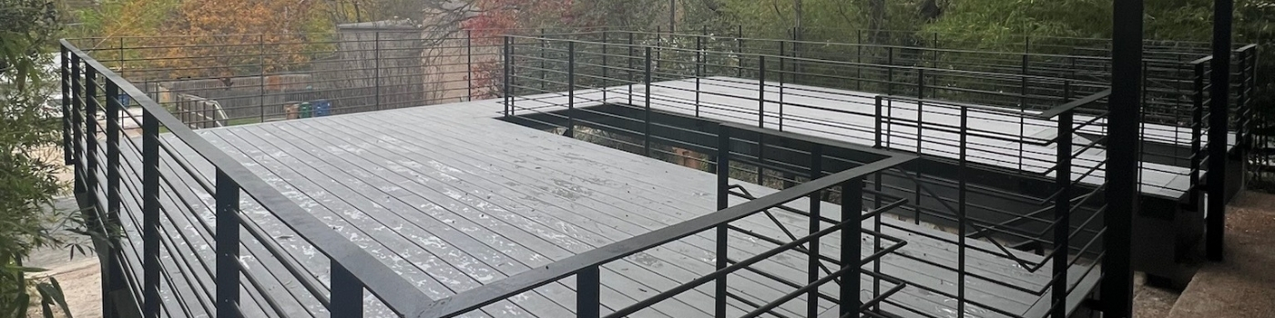 Finished Trex Lineage Rainier deck with steel subframe and custom railing