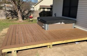 Close-up of Trex Beach Dune deck boards surrounding hot tub edge