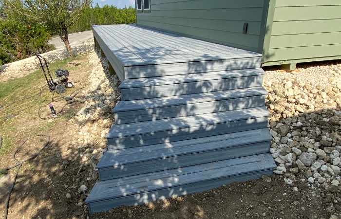 Finished Trex Foggy Wharf deck with clean composite skirting.