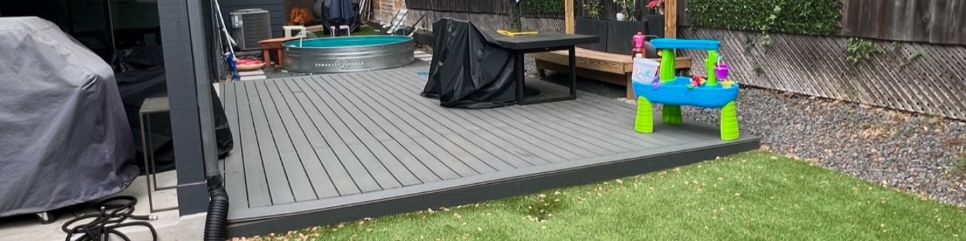 Full view of the backyard with new deck