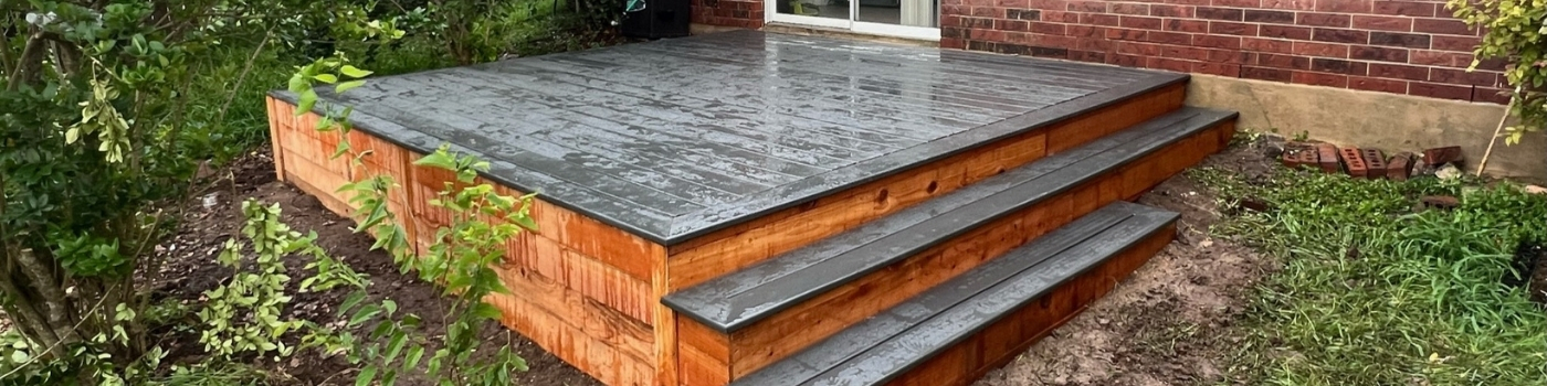 New Trex Clamshell deck with clean cedar skirt and staircase.