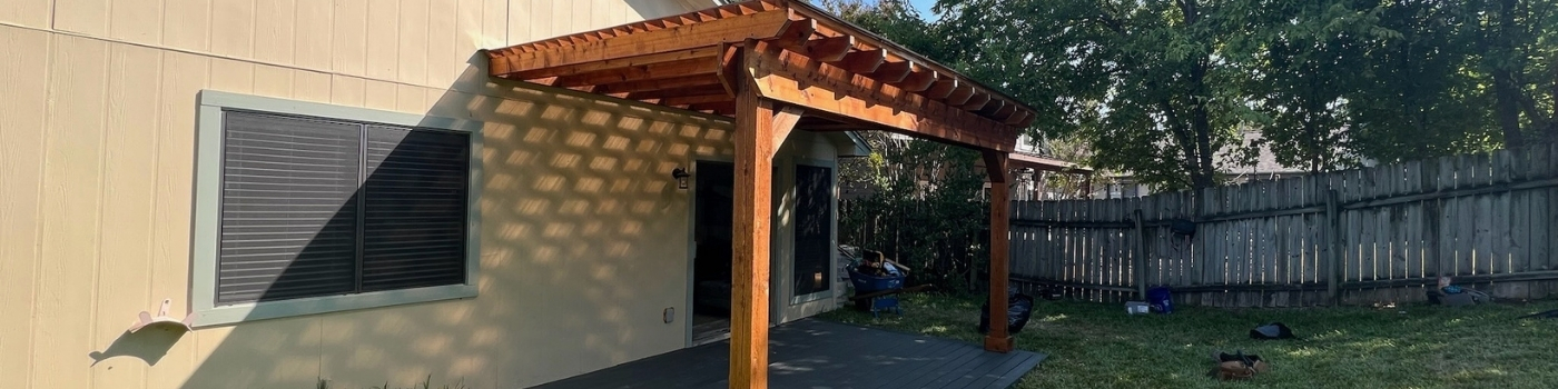Completed Western Red Cedar pergola with a Regal Plastics clear roof.