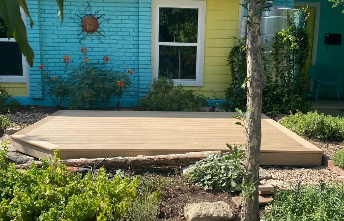 Completed TimberTech Weathered Teak floating deck with clean, finished surface.